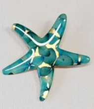 Prendedor Estrella Hortencias
