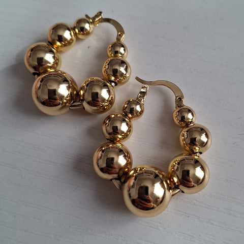 A- 105OL-Aretes Lolly-