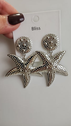 618-11-Aretes Estrellas Plata