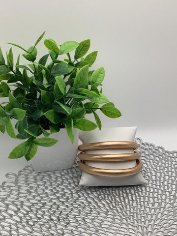 Trío pulseras en aluminio  Colores -Oro