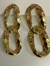 Aretes en cadenas