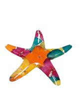 Prendedor de estrella