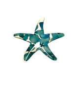 Prendedor de estrella